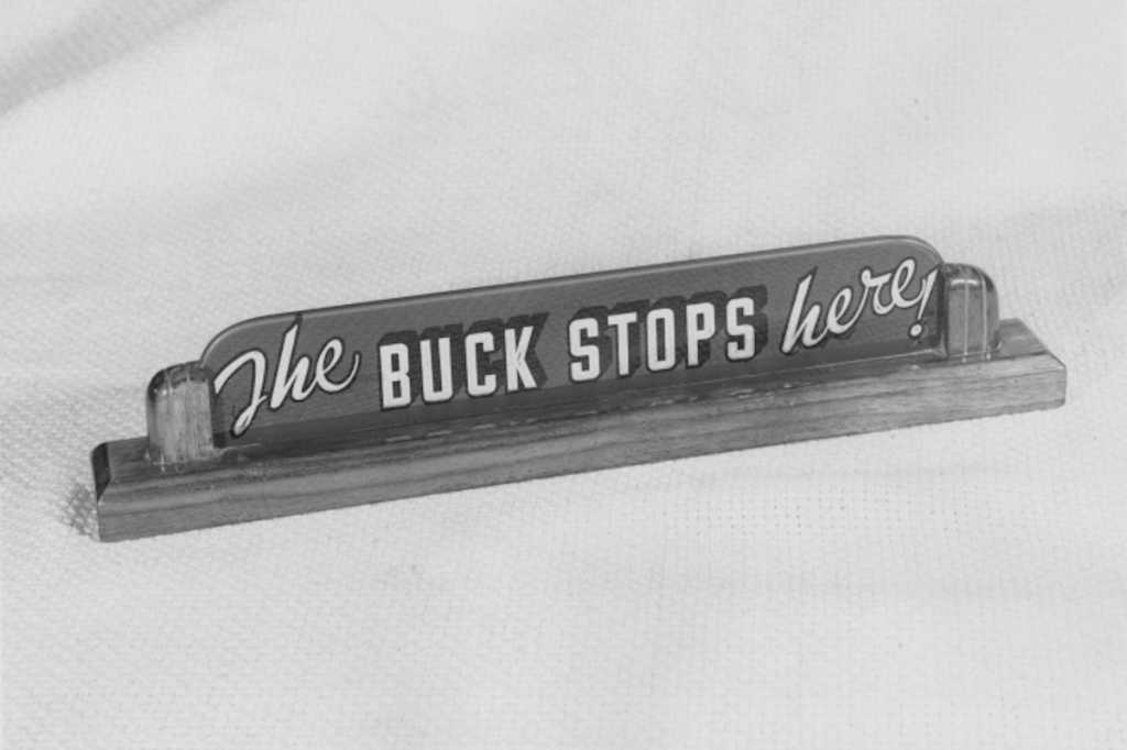 photo of the buck stops here sign that sat on the desk of president harry s truman